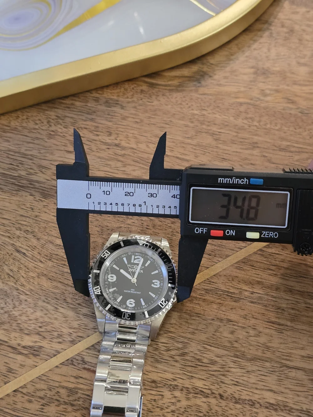 Invicta Silver Stainless Steel Watch with Black Dial and Bezel